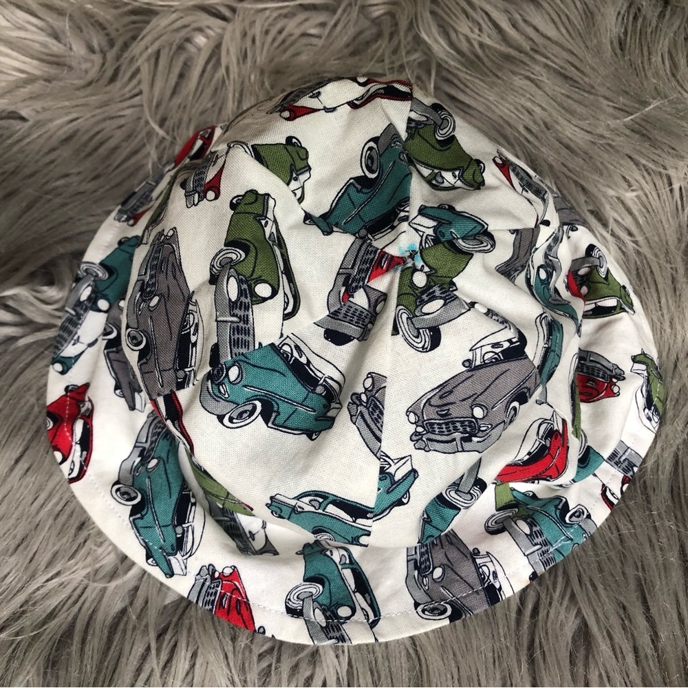 Handmade Infant Sun Hat with Cotton Print of Classic Cars on Cream Background
